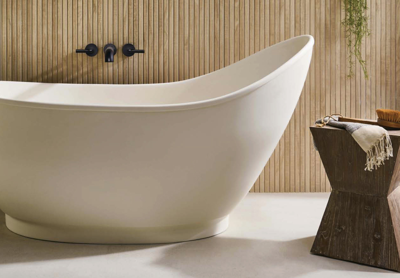 White modern bathtub with wooden wall and black accessories