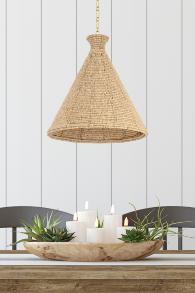 Wicker coastal pendant, table with white candles